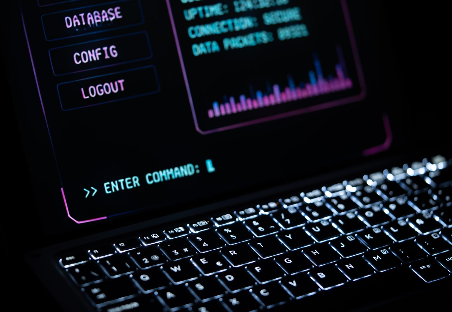 Close-up of a glowing laptop keypad with digital interface, representing futuristic technology.